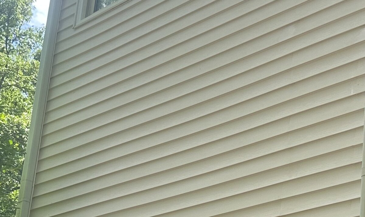 House siding after professional washing — clean and bright